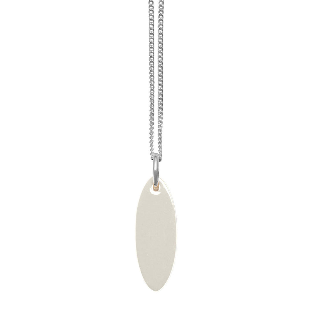 Branch Jewellery Cream and black reversible oval pendant on silver chain