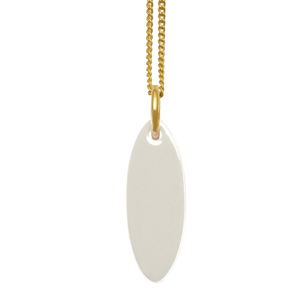 Branch Jewellery Cream and black reversible oval pendant on gold chain