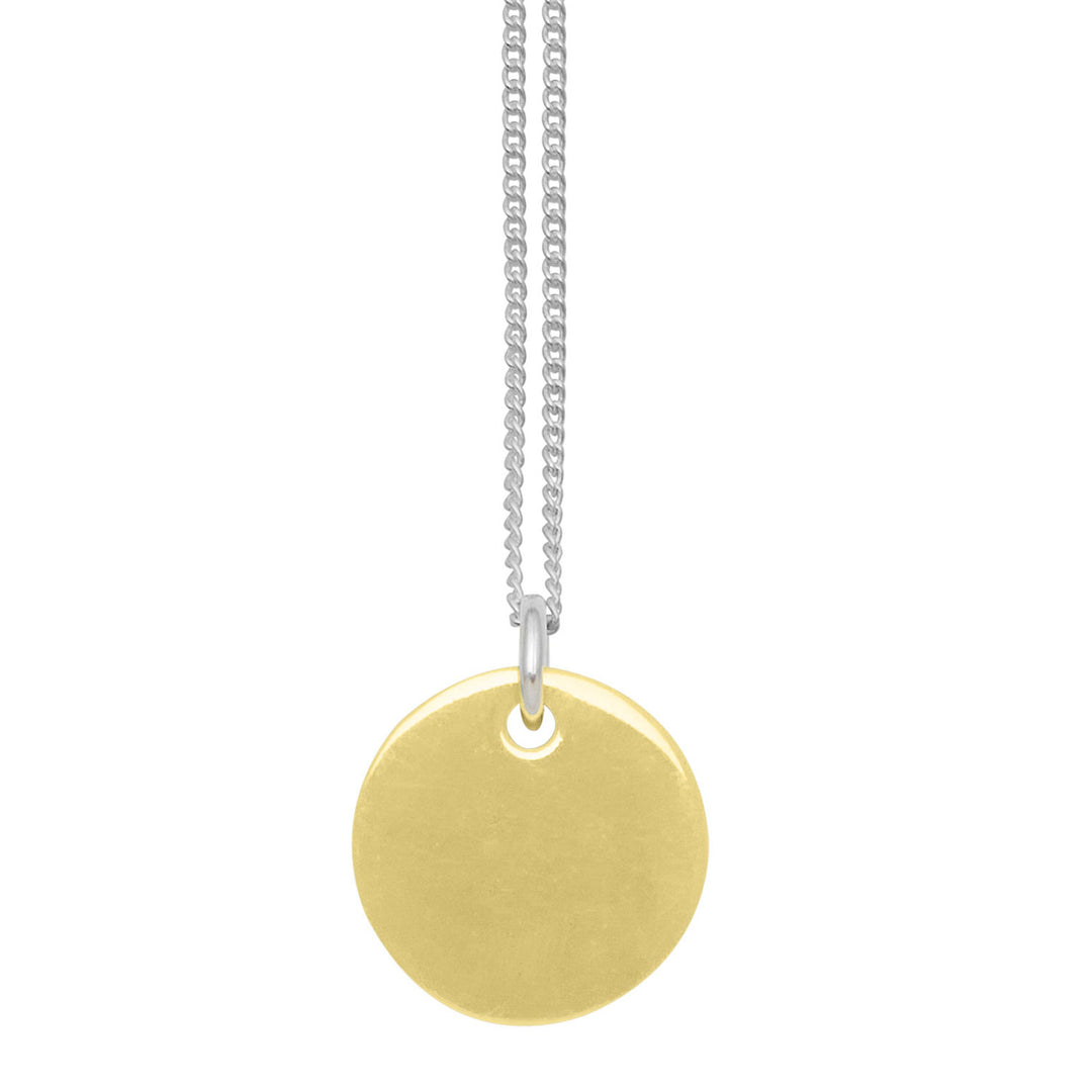 Branch Jewellery - small round reversable gold and black horn disc pendant on a sterling silver chain.
