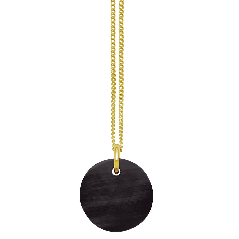 Branch Jewellery - small round reversable green and black horn disc pendant on a gold plated silver chain.