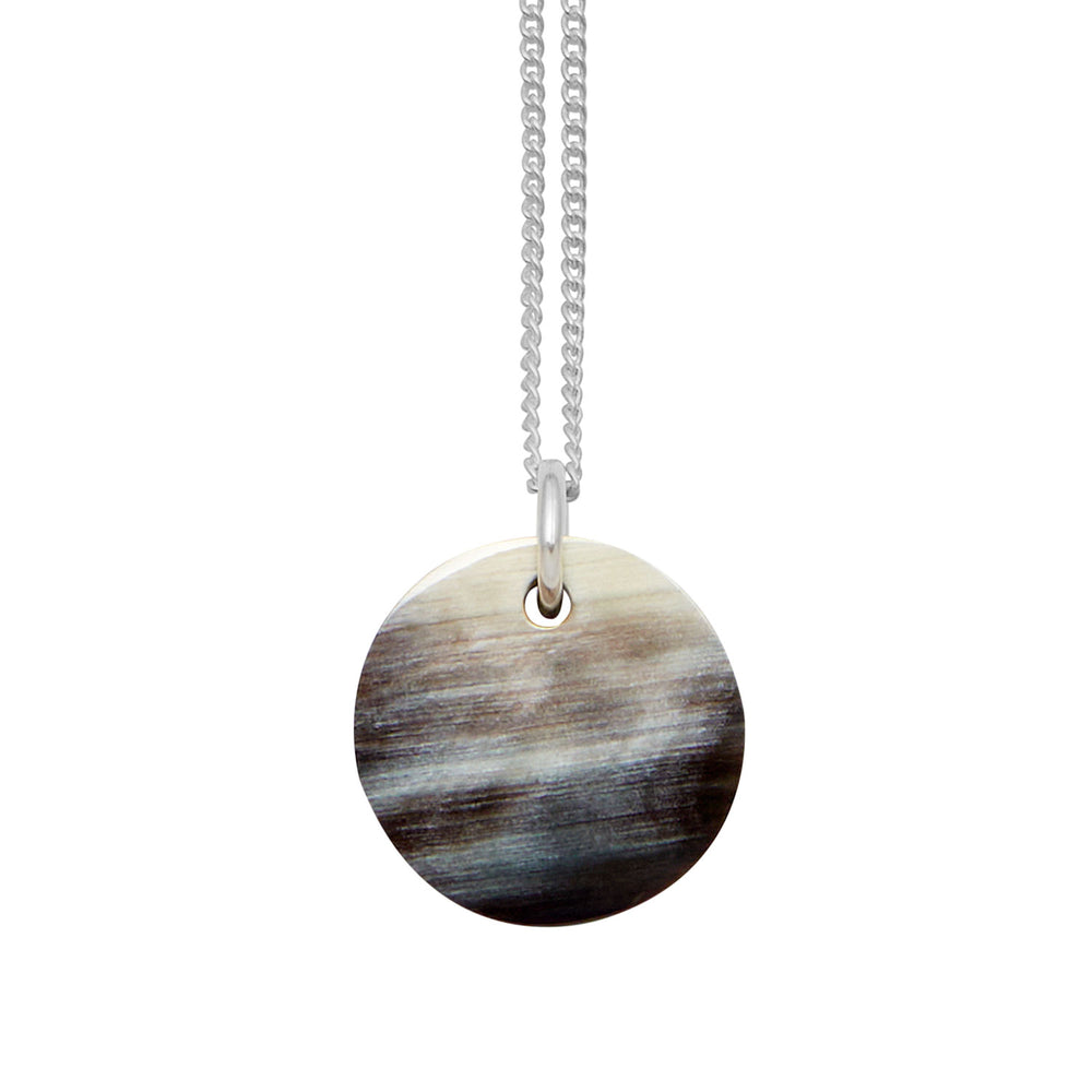 Branch Jewellery - small round black natural horn disc pendant on a sterling silver chain.