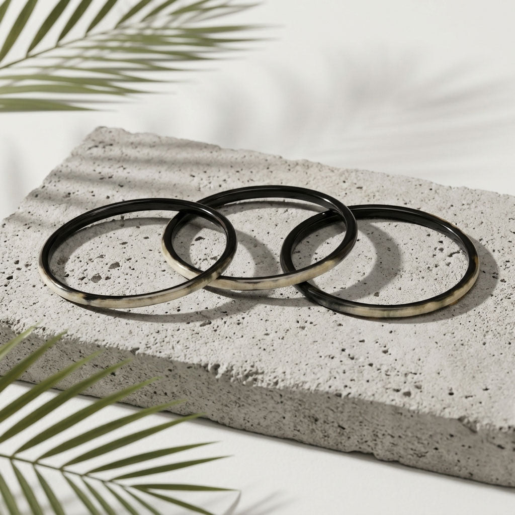 Zuri black natural buffalo horn set of three slim stacking bangles photographed for Branch Jewellery