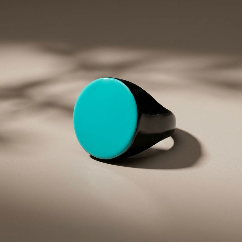 Branch Jewellery round horn statement cocktail ring with natural black horn base and a smooth Turquoise Blue lacquered round top.