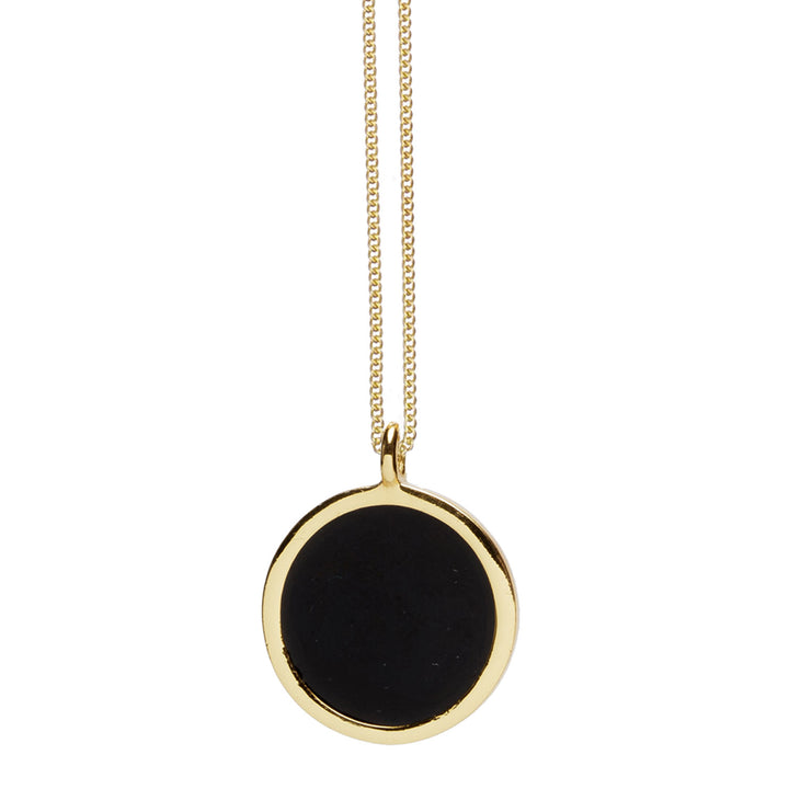 Gold and black enamel pendant
