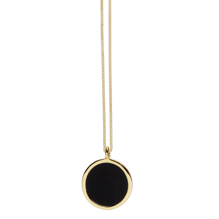 Gold and black enamel pendant