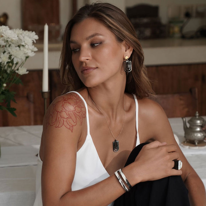 Brown Natural horn cut-out chandelier earrings - Gold