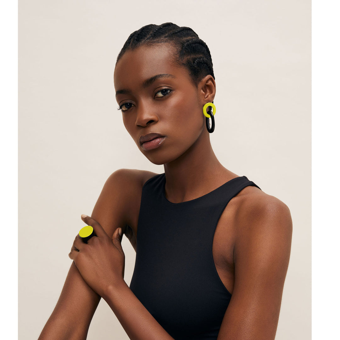 Branch Jewellery - Yellow and black round and oval horn link earring.