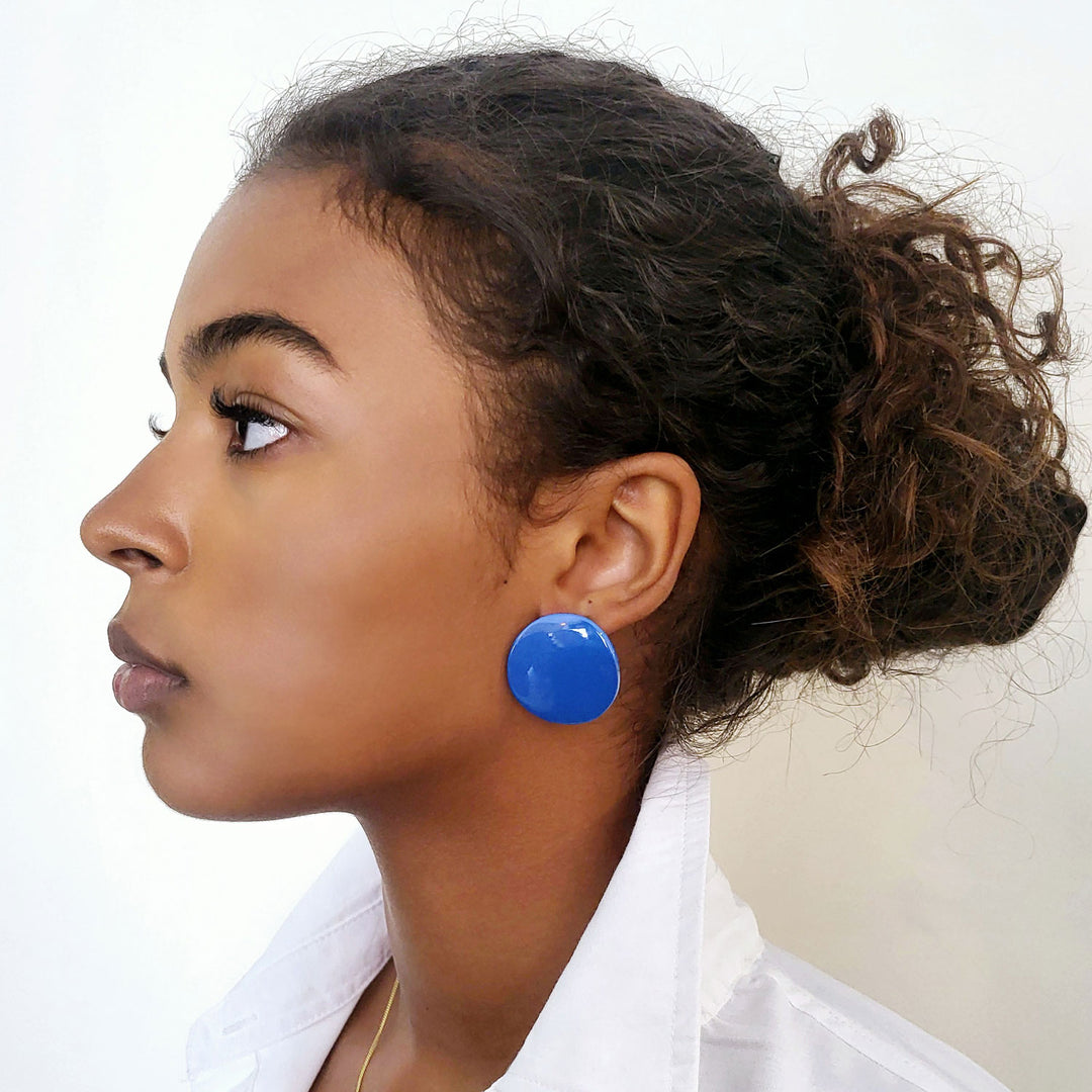 Bright blue curved stud earrings