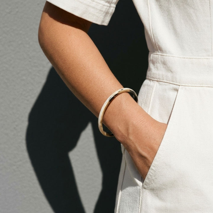 Zuri white natural buffalo horn slim stacking bangle, handmade by Branch Jewellery