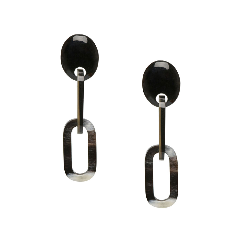 The Natural Horn Chain Drop Earrings – Black Natural by Branch Jewellery feature two handcrafted pieces with a round top and oval dangle, made from sustainably sourced black horn.