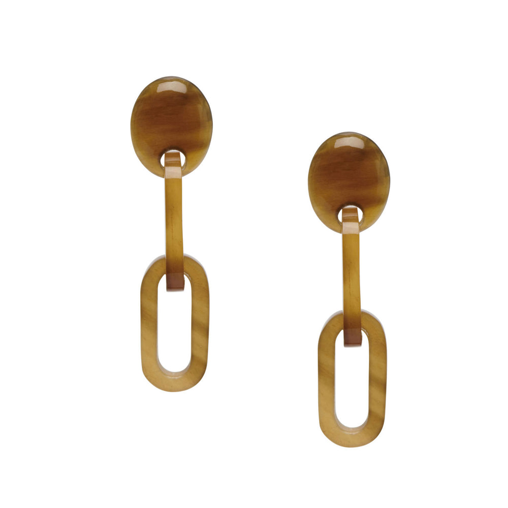 The Natural Horn Chain Drop Earrings – Brown Natural by Branch Jewellery are caramel-colored, geometric dangle earrings crafted from sustainably sourced horn, featuring a circular top and elongated oval bottom for an elegant and eco-conscious design.