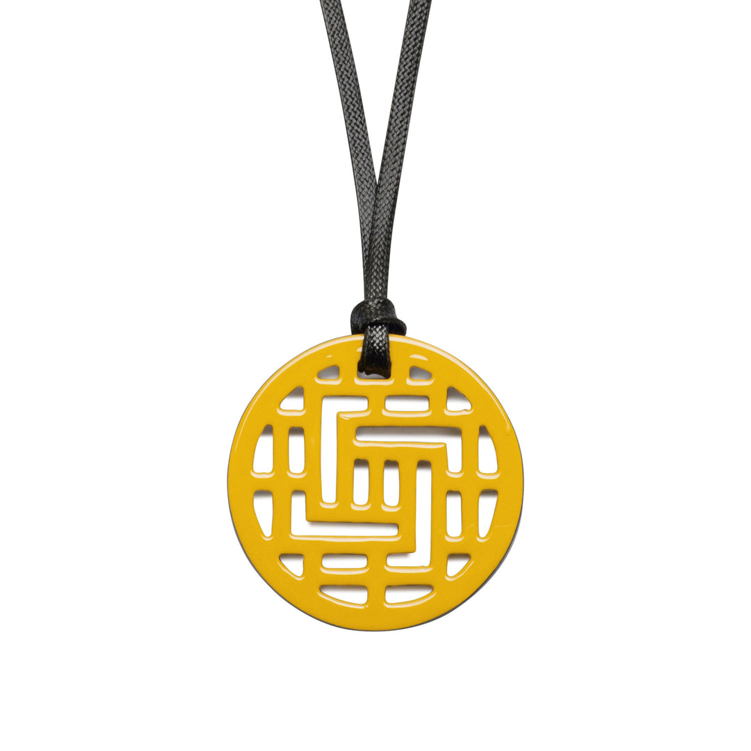 Moko Geometric Patterned Yellow Round cut-out Horn Pendant