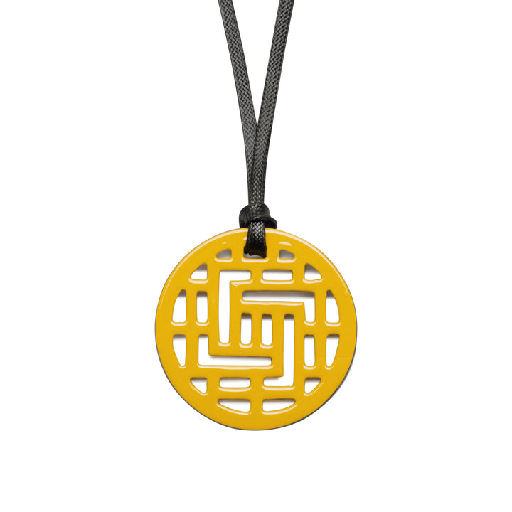 Moko Geometric Patterned Yellow Round cut-out Horn Pendant
