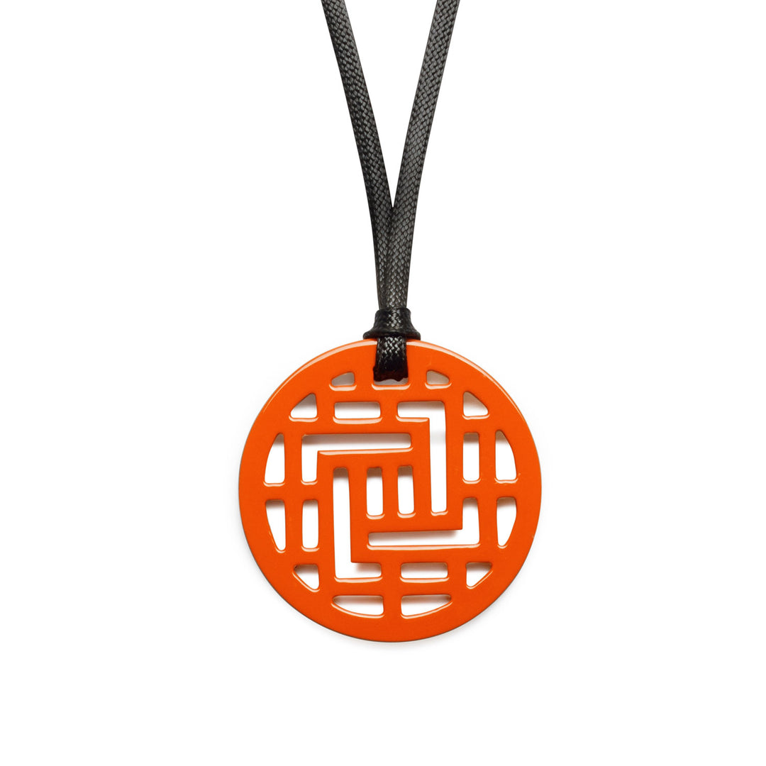 Moko Geometric Patterned Orange Round cut-out Horn Pendant