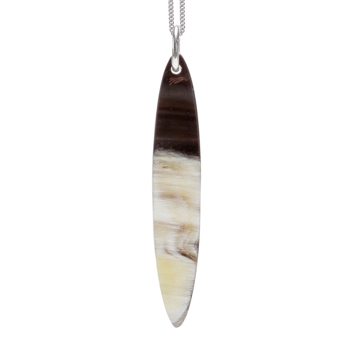 Branch Jewellery - long black natural oval horn pendant on a sterling silver chain.