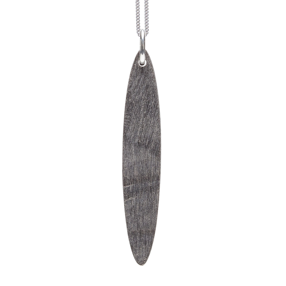 Branch Jewellery - long grey natural oval horn pendant on a sterling silver chain.