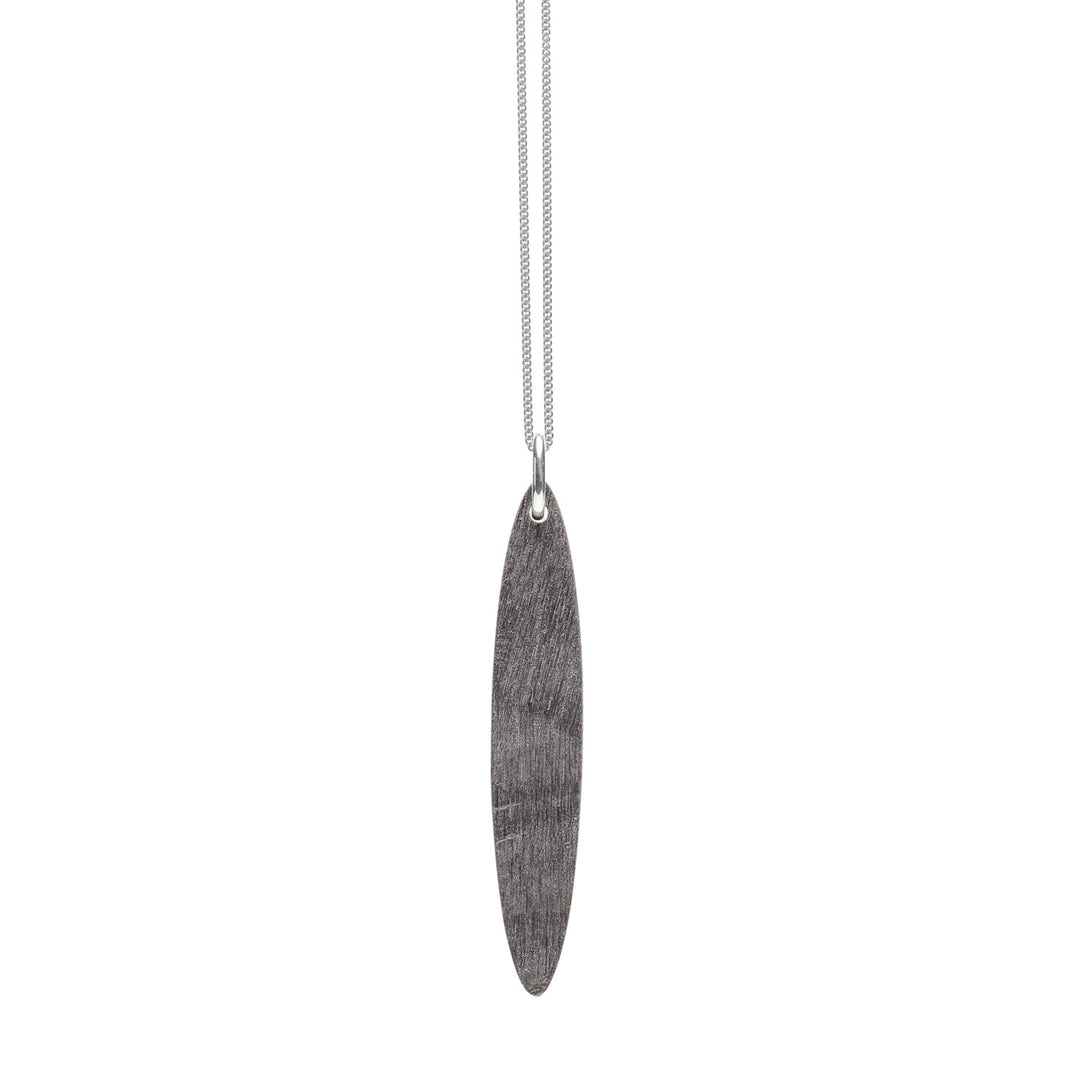 Branch Jewellery - long grey natural oval horn pendant on a sterling silver chain.