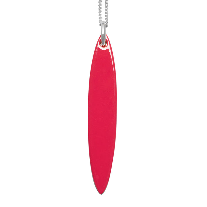 Branch Jewellery - long Red and black natural reversable oval horn pendant on a sterling silver chain.