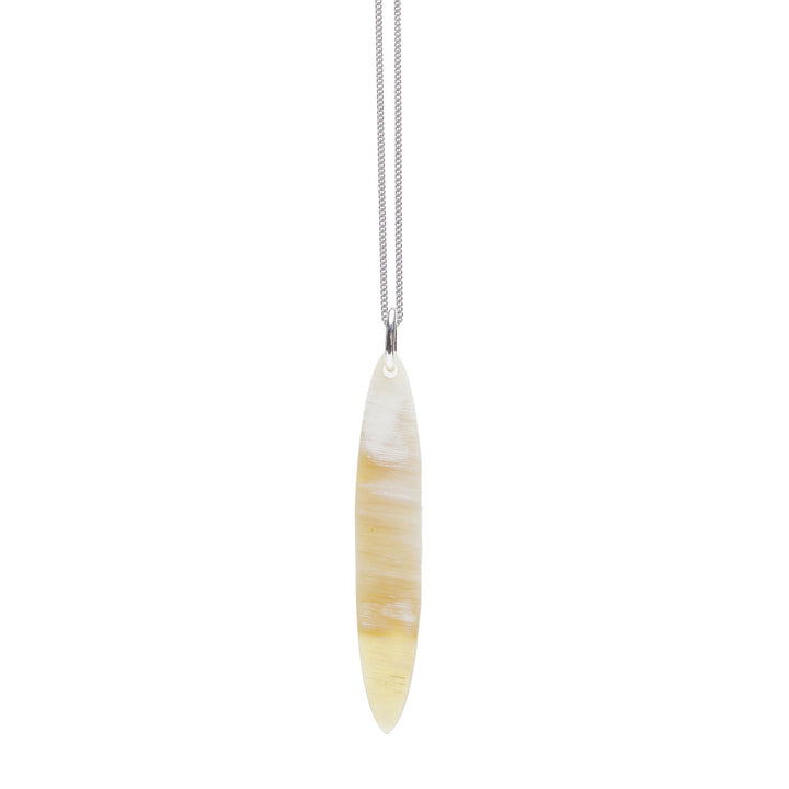 Branch Jewellery - long Blue and white natural reversable oval horn pendant on a sterling silver chain.