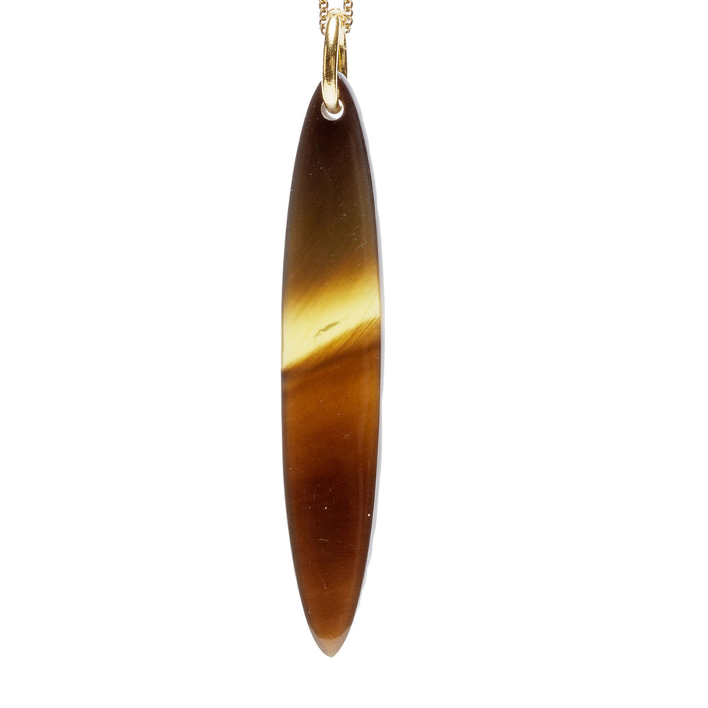 Branch Jewellery - brown natural oval horn pendant on a gold plated silver chain.