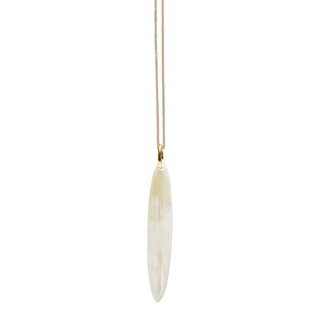 Branch Jewellery -White natural oval horn pendant on a gold plated silver chain.