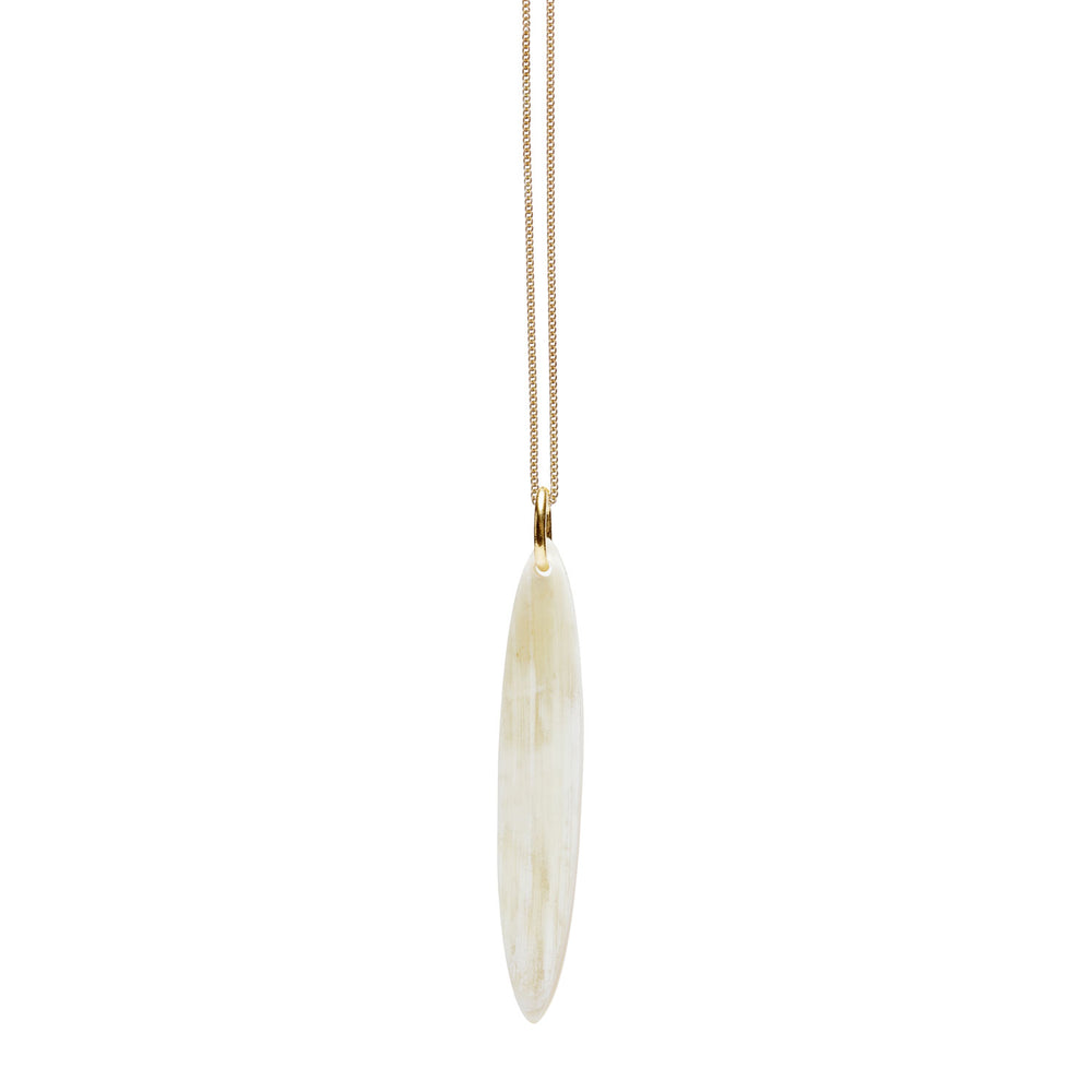 Branch Jewellery - long blue and white natural reversable oval horn pendant on a gold plated silver chain.
