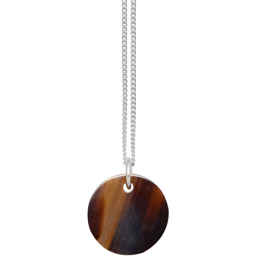 Branch Jewellery - small round reversable orange and brown natural horn disc pendant on a sterling silver chain.