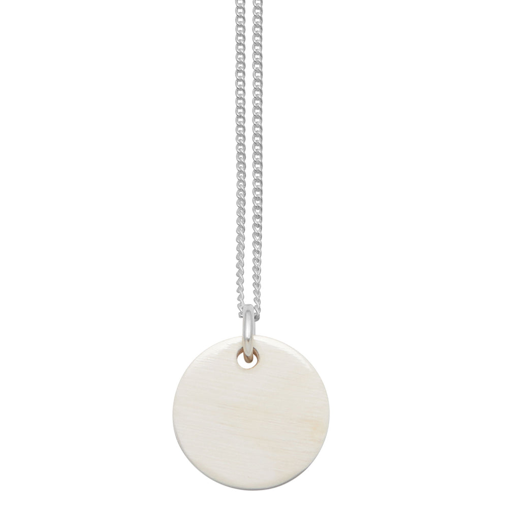 Branch Jewellery - small round reversable pink and white natural horn disc pendant on a sterling silver chain.