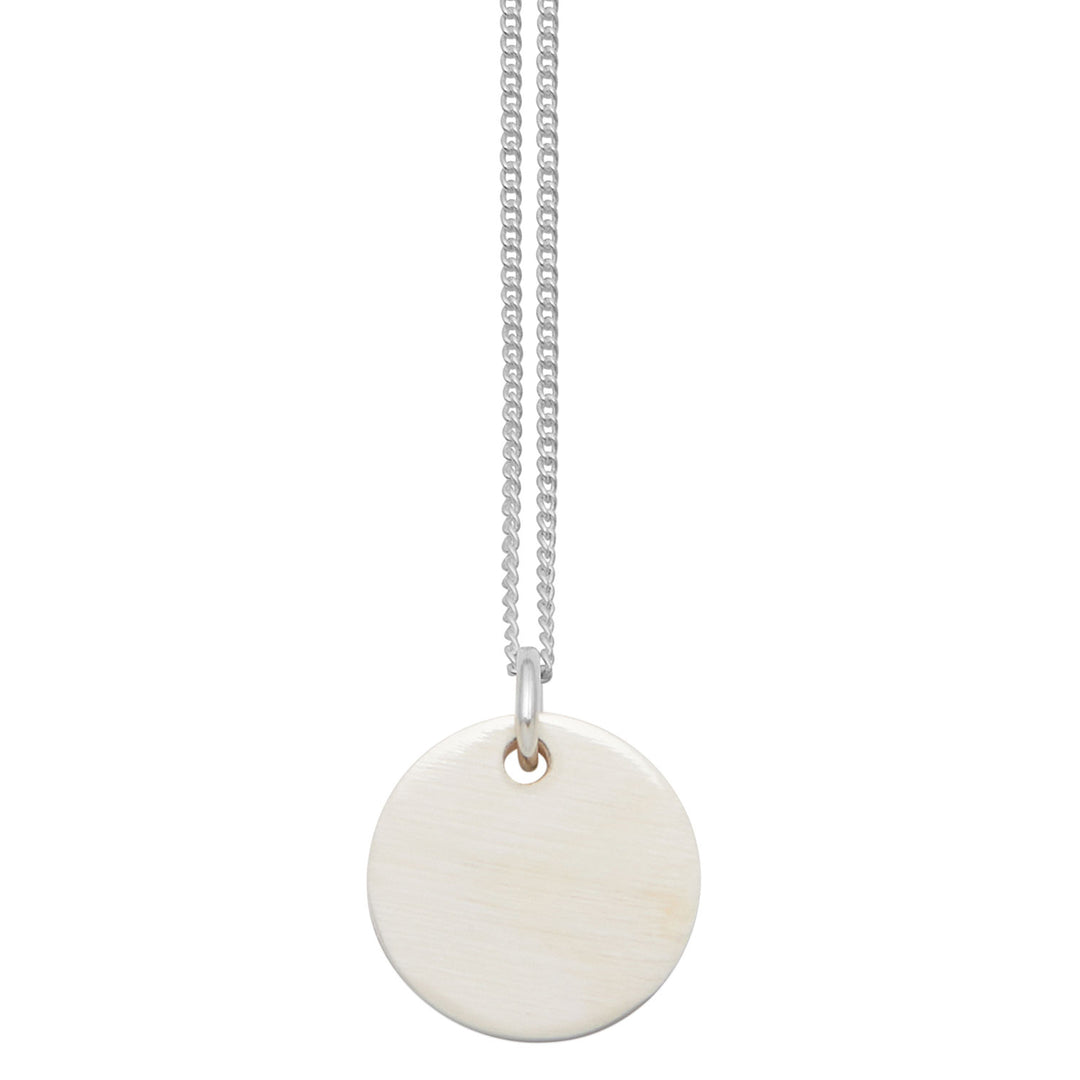 Branch Jewellery - small round reversable pink and white natural horn disc pendant on a sterling silver chain.