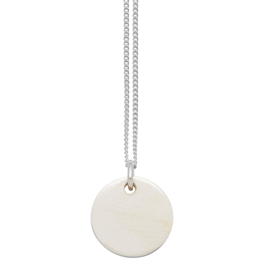 Branch Jewellery - small round reversable blue and white natural horn disc pendant on a sterling silver chain.