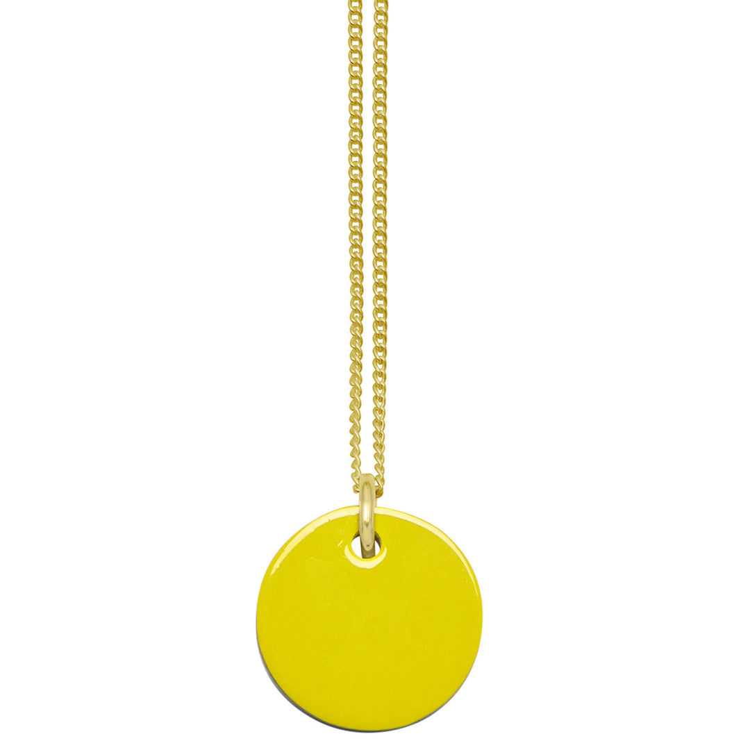 Branch Jewellery - small round reversable yellow and black horn disc pendant on a gold plated silver chain.