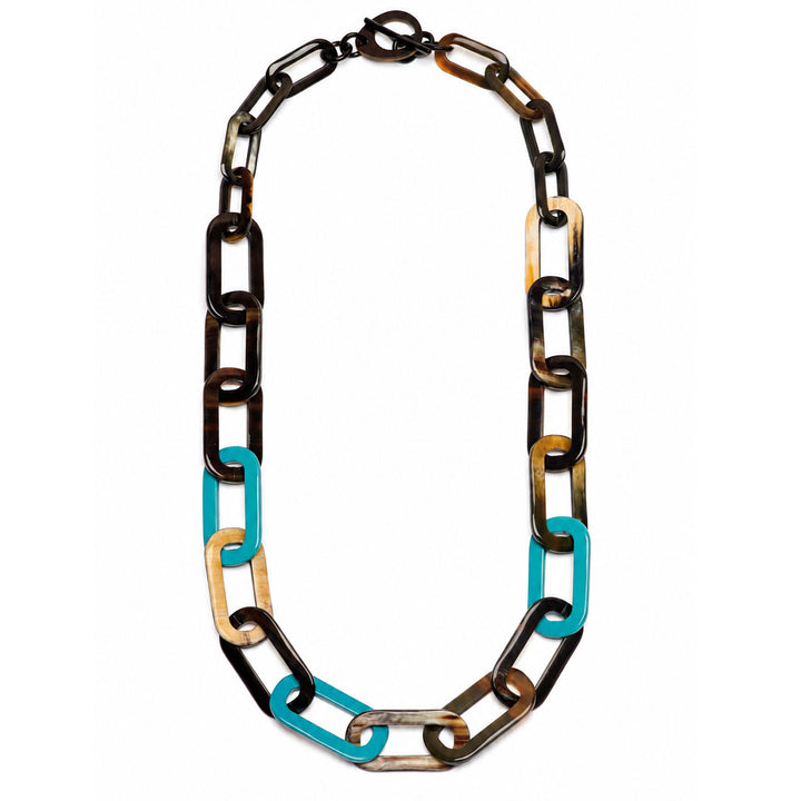 The Bright Turquoise Blue and Black Natural Large Rectangle Link Necklace by Branch Jewellery is handmade with interlocking links in black, tan, brown, and blue, featuring a toggle clasp for easy wear.
