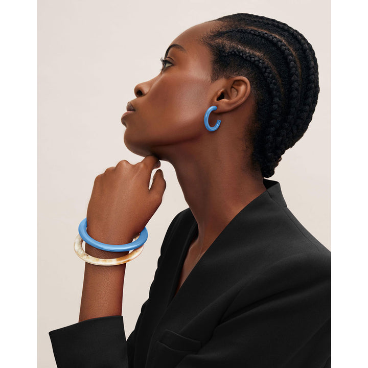 Rounded blue Lacquered horn hoop earring