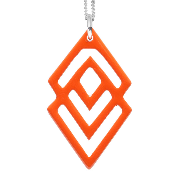 Orange lacquered and silver geometric shaped pendant