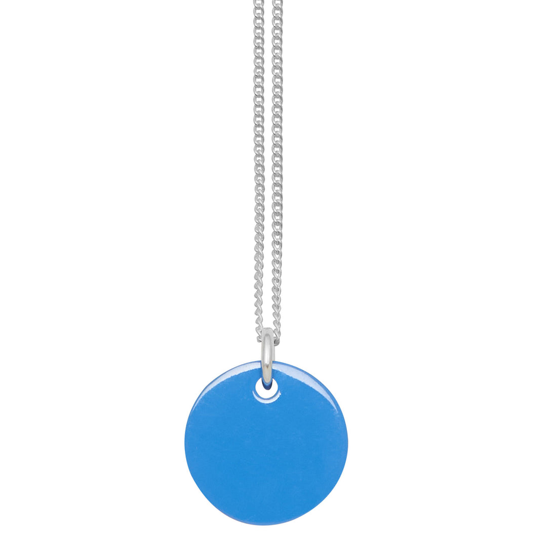 Branch Jewellery - small round reversable blue and white natural  horn disc pendant on a sterling silver chain.