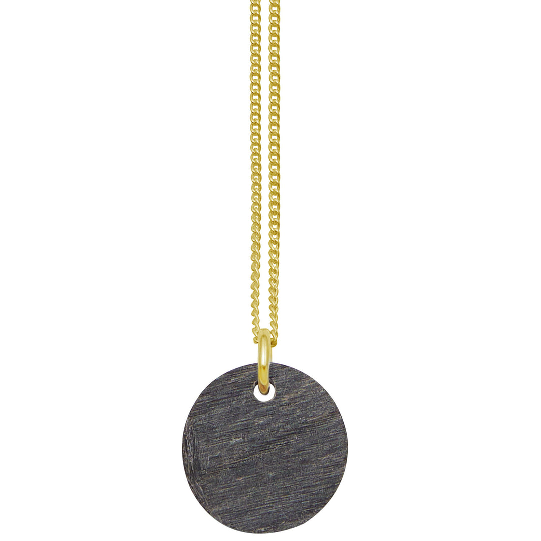 Branch Jewellery - small round reversable grey natural and black horn disc pendant on a gold plated silver chain.