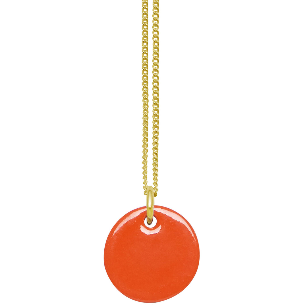 Branch Jewellery - small round reversable orange and brown natural natural horn disc pendant on a gold plated silver chain.