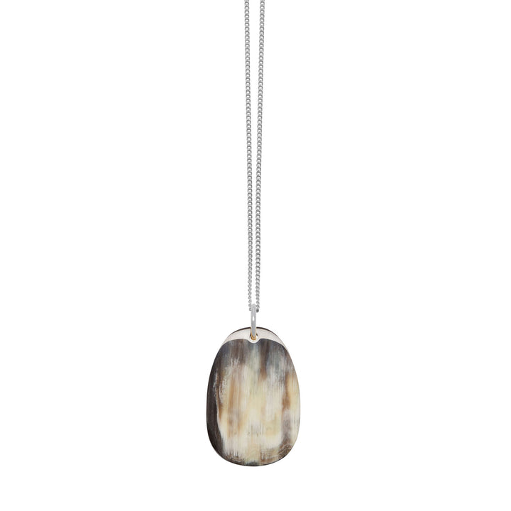Branch Jewellery - Black natural oval horn pendant on silver chain.